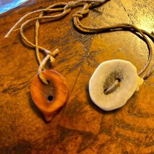 3 unique buttons (1 animal bone and 2 wood)